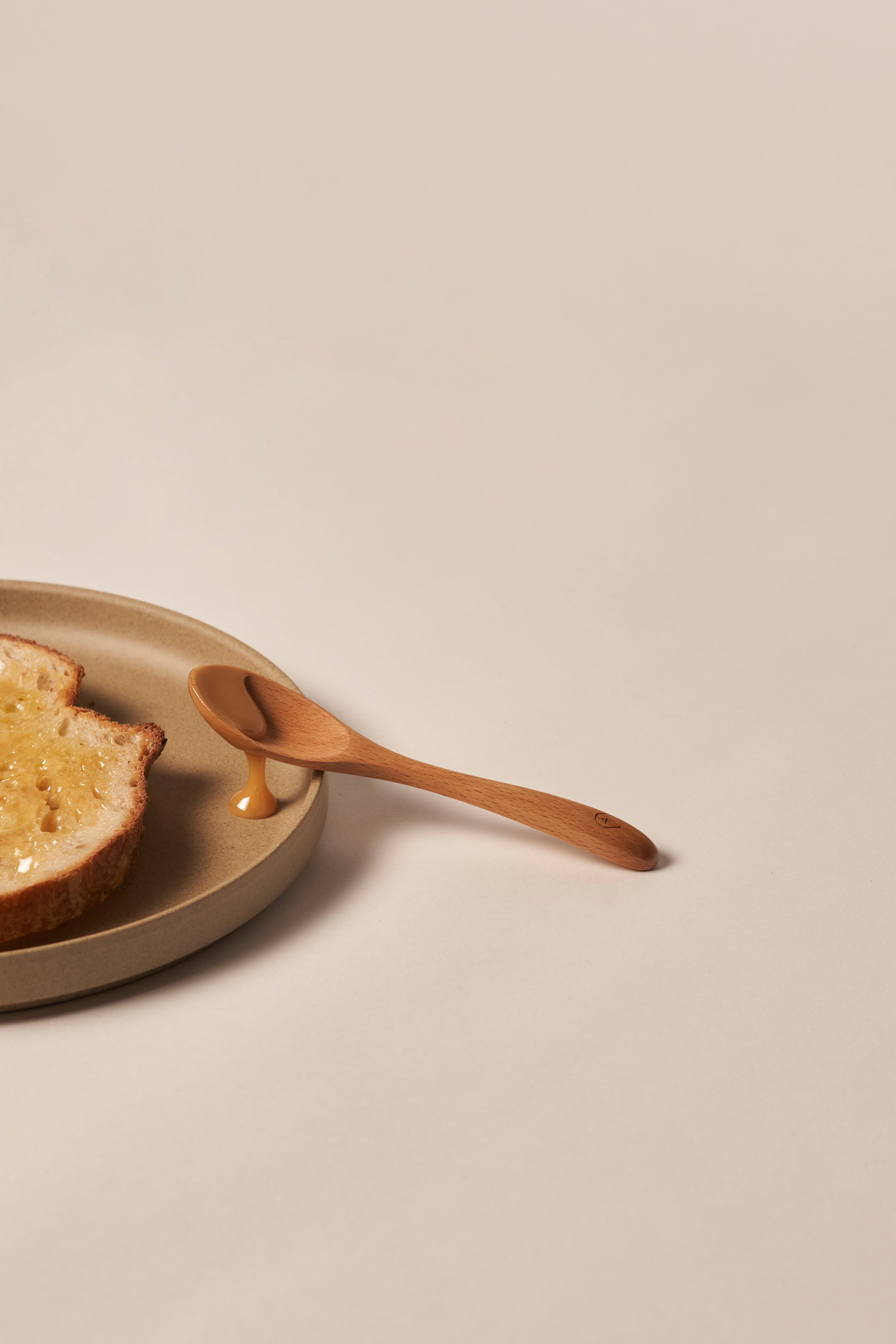 Why We Recommend Wooden Spoons for Honey